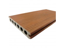 Co-extrusing composite decking